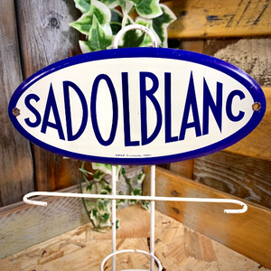 Présentoir publicitaire Sadolblanc, produit Sadol crème à chaussure.