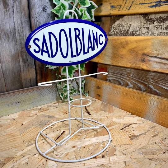 Présentoir publicitaire Sadolblanc, produit Sadol crème à chaussure.