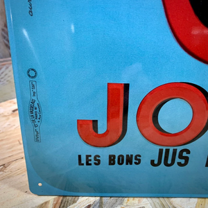 Plaque publicitaire en métal embouti pour les jus de fruits JOKER signée Jacques Auriac