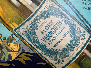 Affiche publicitaire entoilée pour l’apéritif Vermouth Flory. Mouchotte frères.
