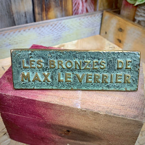 Présentoir publicitaire en bronze Max Le Verrier