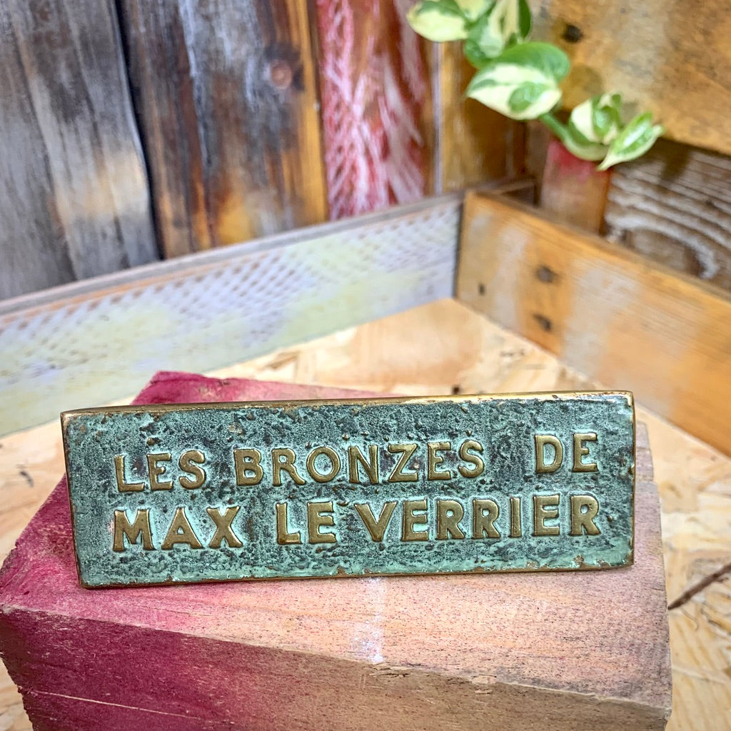 Présentoir publicitaire en bronze Max Le Verrier